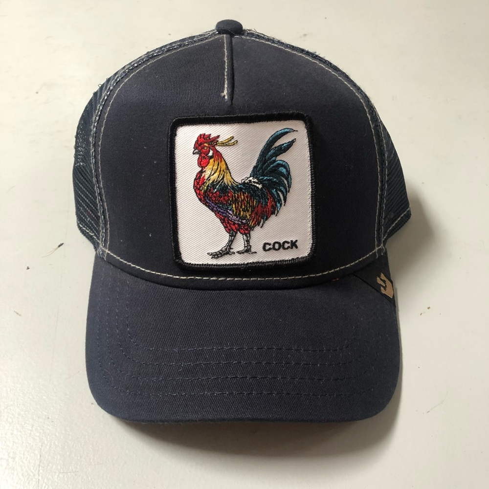 “Cock” hat
